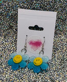 Blue flower smiley earrings